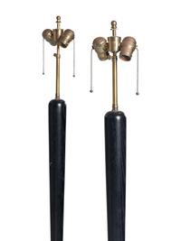 A Pair of Ebonized Wood Floor Lamps