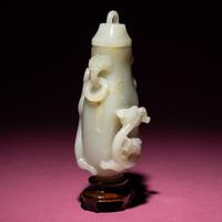 A Chinese Pale Celadon Jade 'Dragon' Covered Vase, 18th/19th Century — 清中期 青白玉螭龍紋雙耳賞瓶