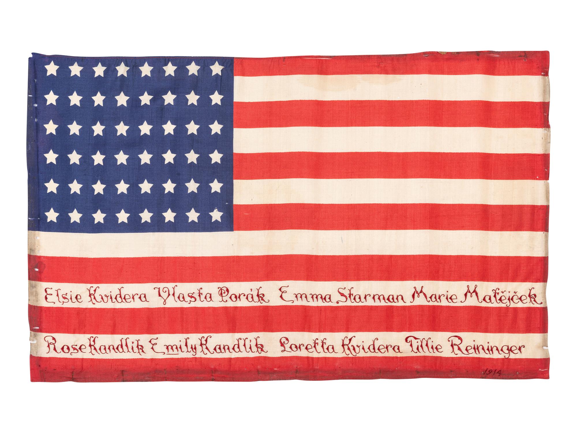[FLAGS]. 48-star American parade flag identified to eight women, likely honoring their naturalization as US citizens. 1914.