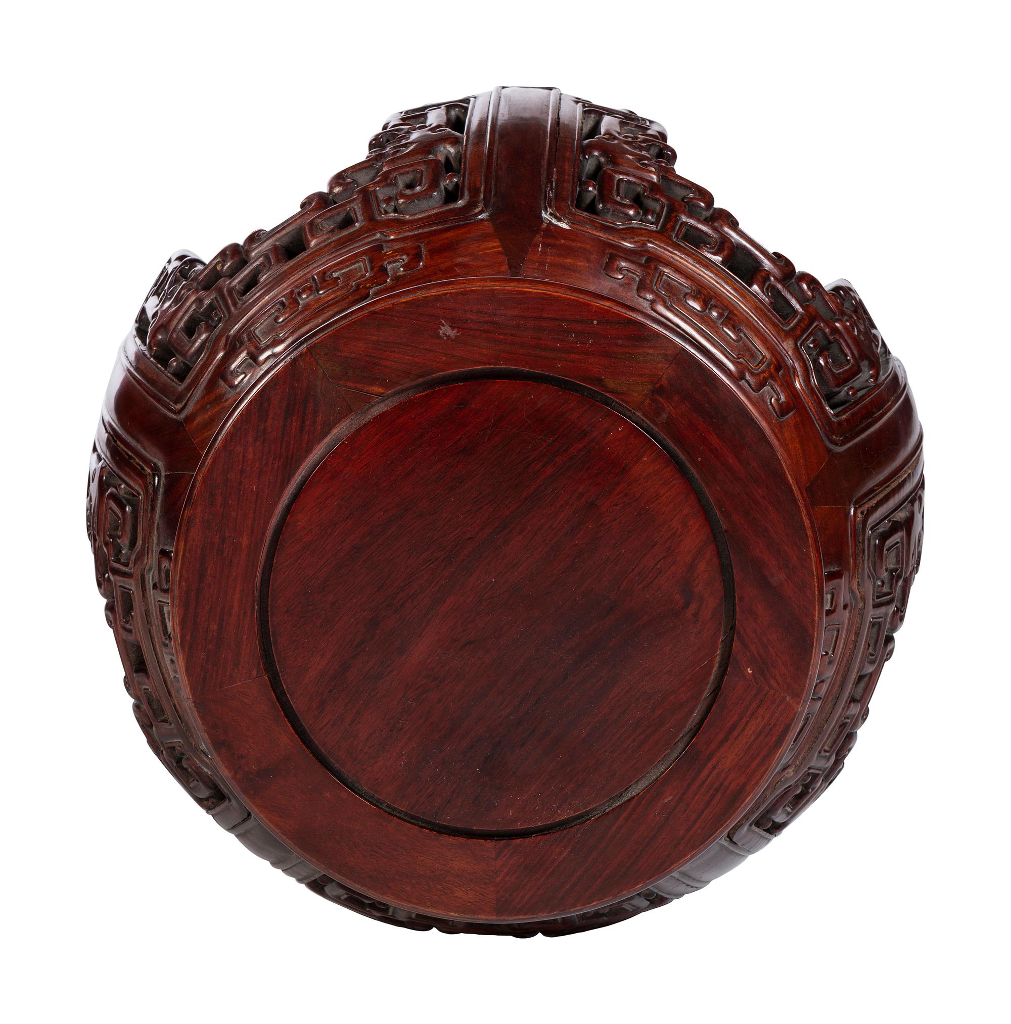 Two Carved Hardwood Fern Stands