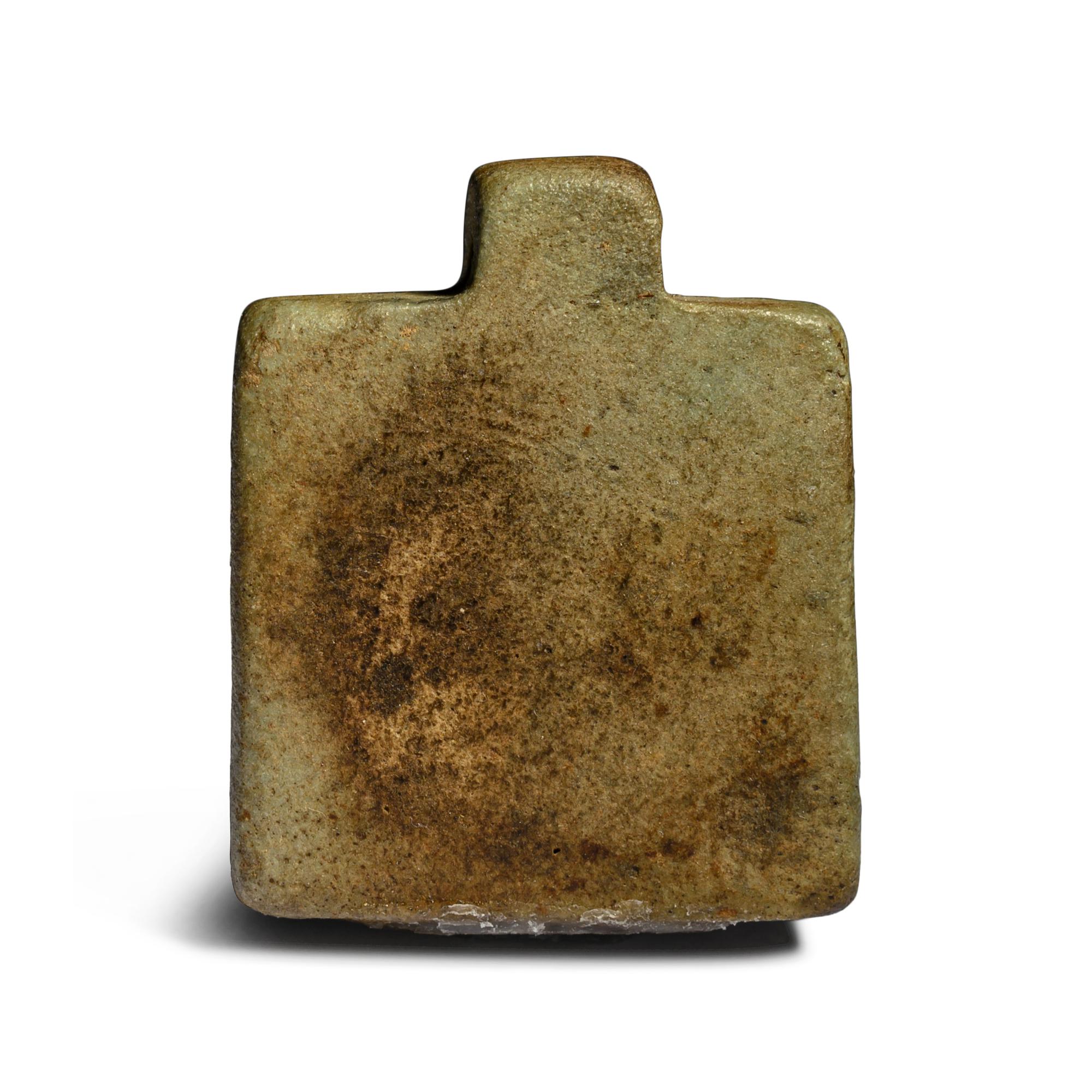 An Egyptian Faience Triad Amulet