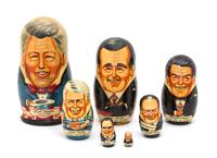 A Collection of Three Russian Bill Clinton Nesting Dolls Height of tallest 10 1/2 inches. — 20TH CENTURY