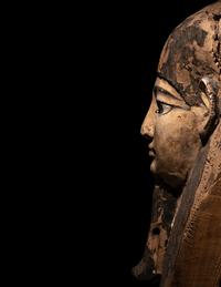 An Egyptian Painted Wood Mummy Mask