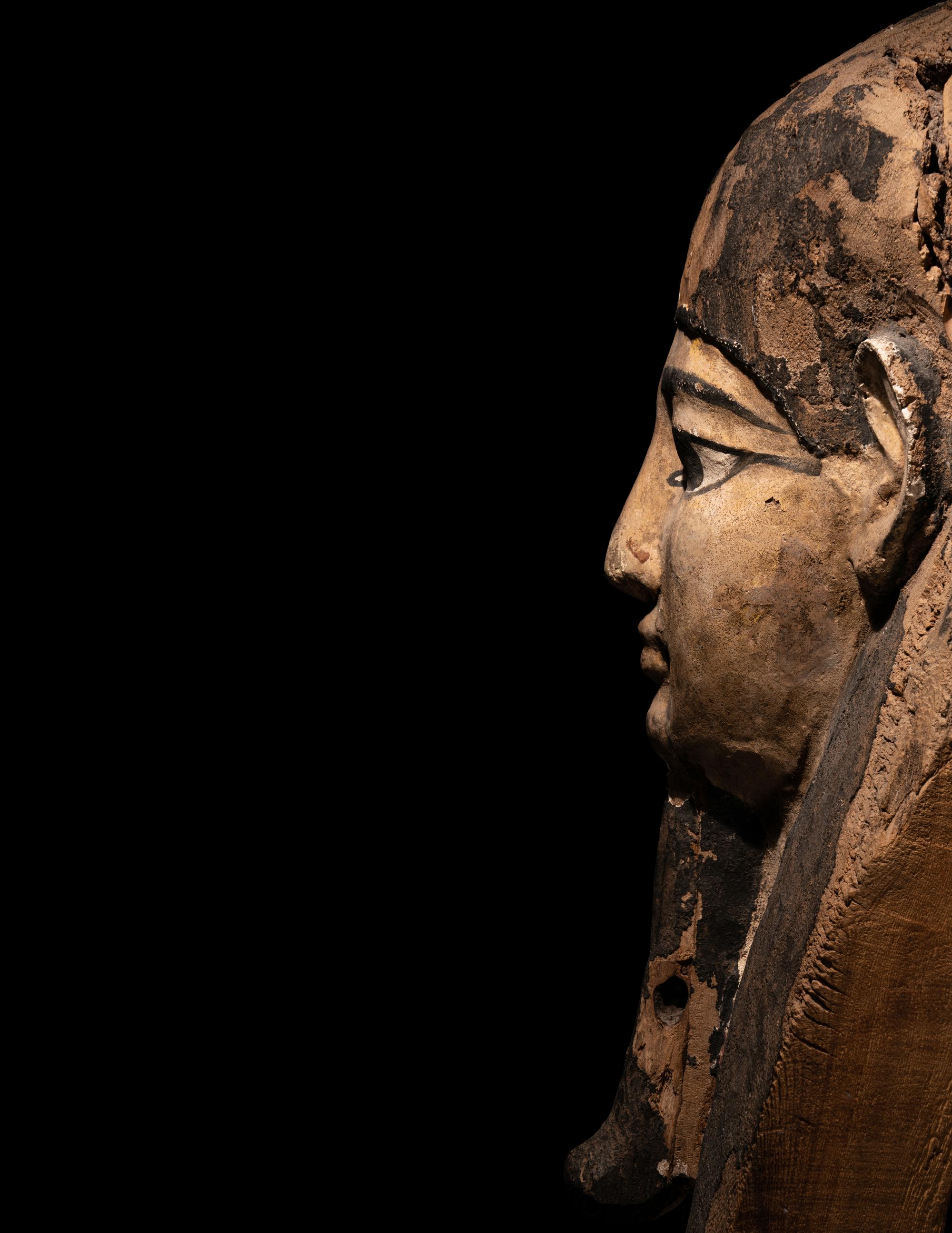 An Egyptian Painted Wood Mummy Mask