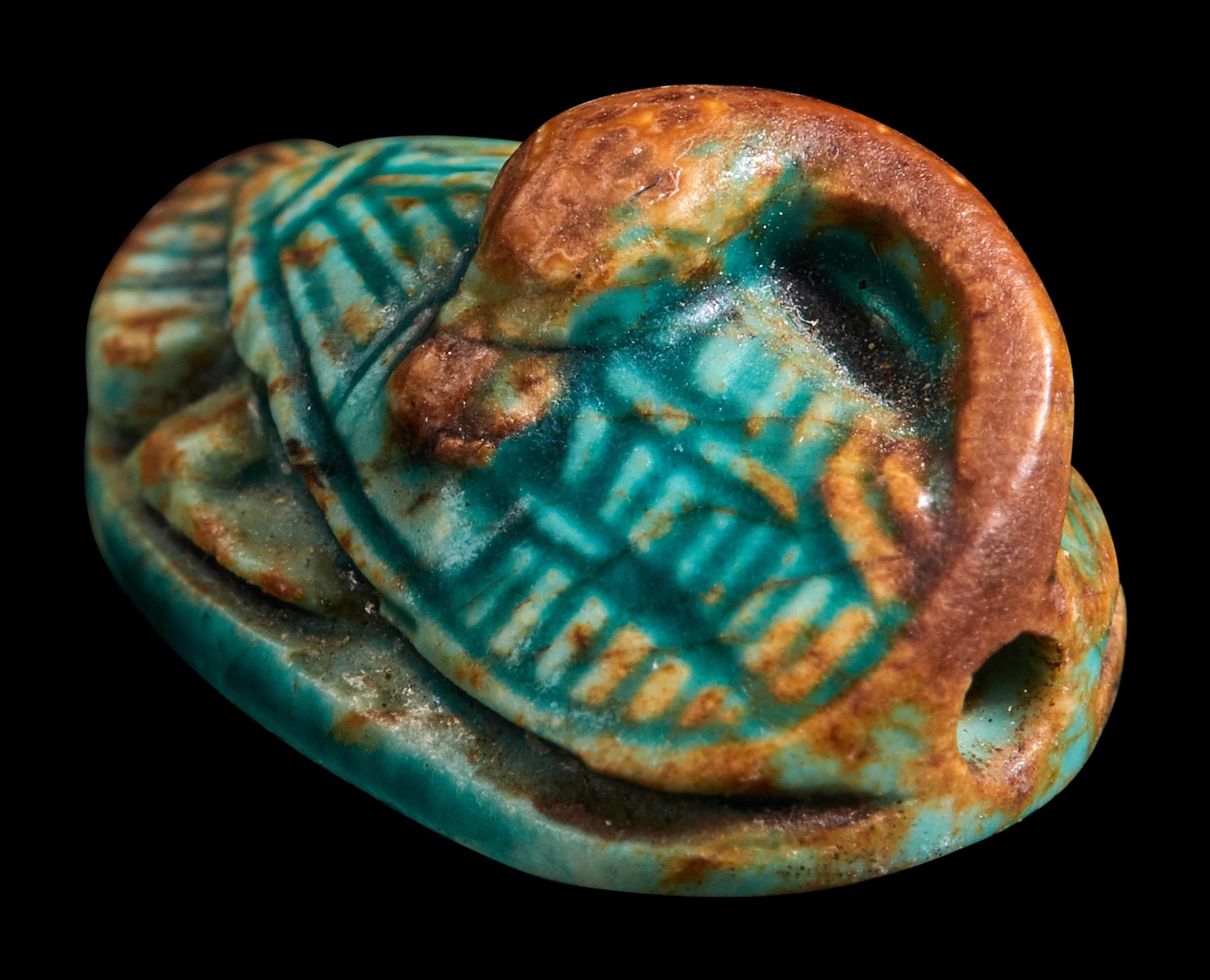 An Egyptian Faience Duck Scaraboid
