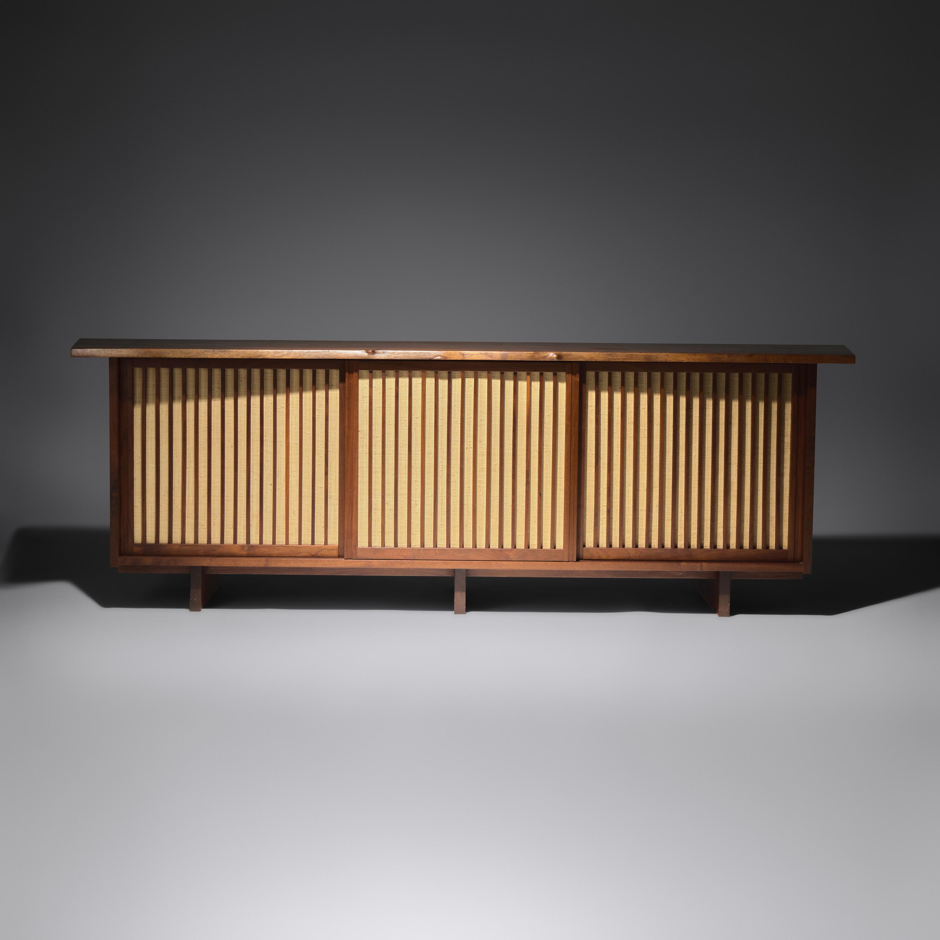 George Nakashima (American, 1905–1990) — Triple Sliding Door Cabinet