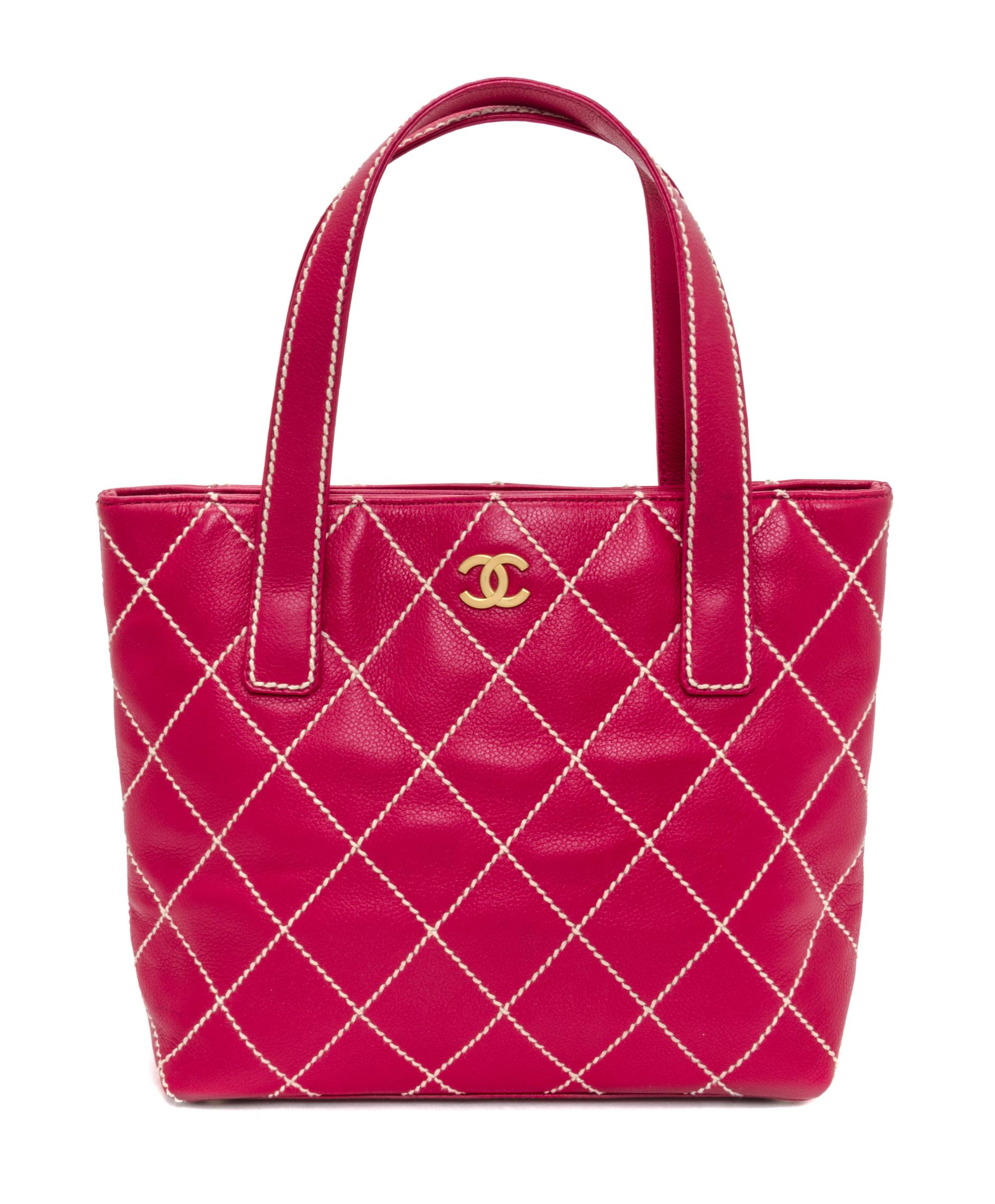 A Chanel Raspberry Caviar Leather Handbag, 12" x 9" x 3".