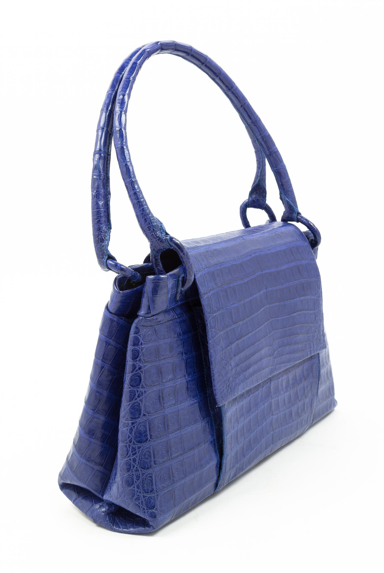 A Nancy Gonzalez Blue Columbian Crocodile Handbag, 13" x 9" x 2.75"; Handle drop: 7".
