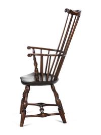 A Volute Carved Comb-Back Knuckle-Arm Windsor Armchair