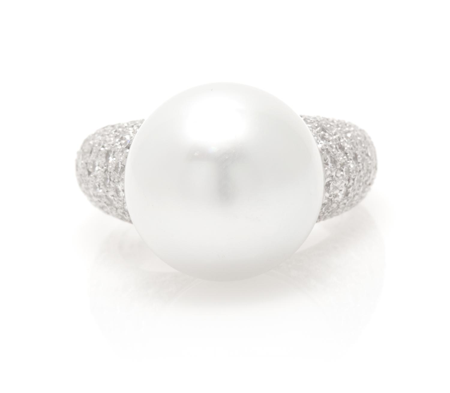A Platinum, Diamond and Cultured South Sea Pearl Ring, 10.70 dwts.