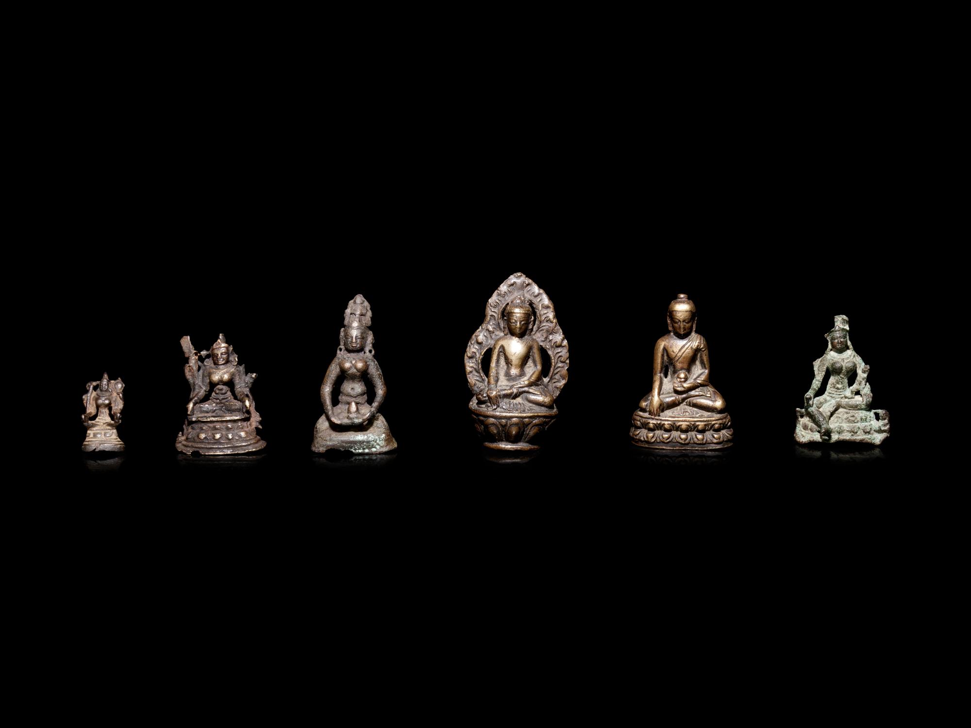 Six Small Tibetan and Southeast Asian Bronze Figures of Deities