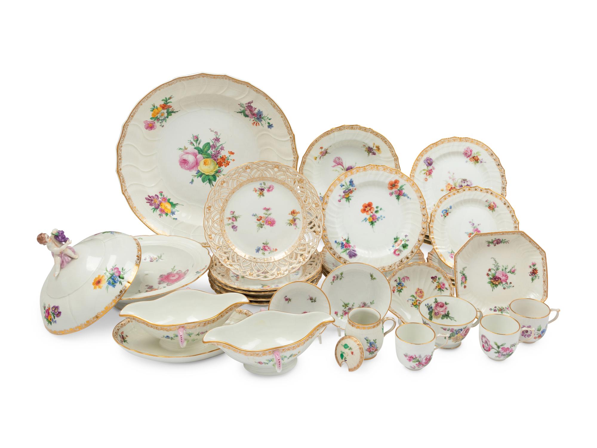A Berlin (K.P.M.) Porcelain Dinner Service