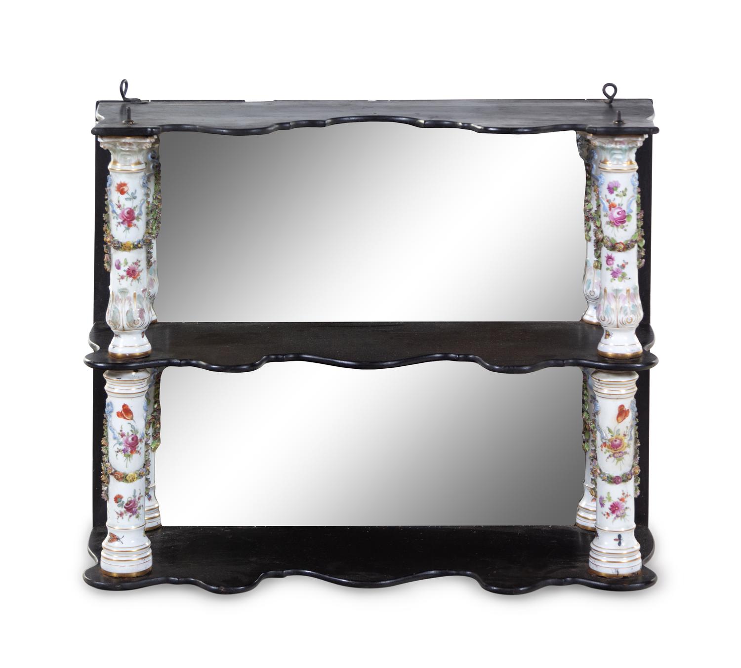 A Meissen Porcelain Mounted Ebonized Shelf