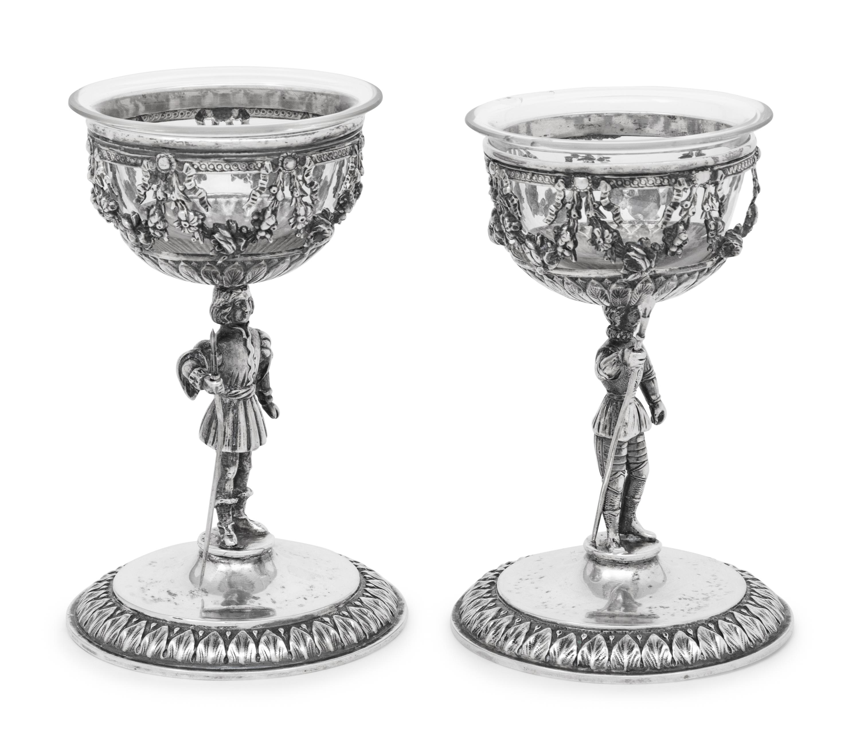 A Pair of German Silver Figural Goblets with Glass Liners