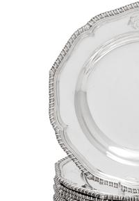 A Set of Twelve Silver Armorial Soup Plates