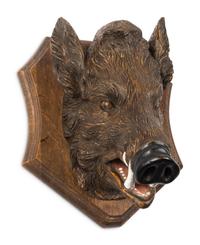 A Black Forest Carved Boar Head Mount