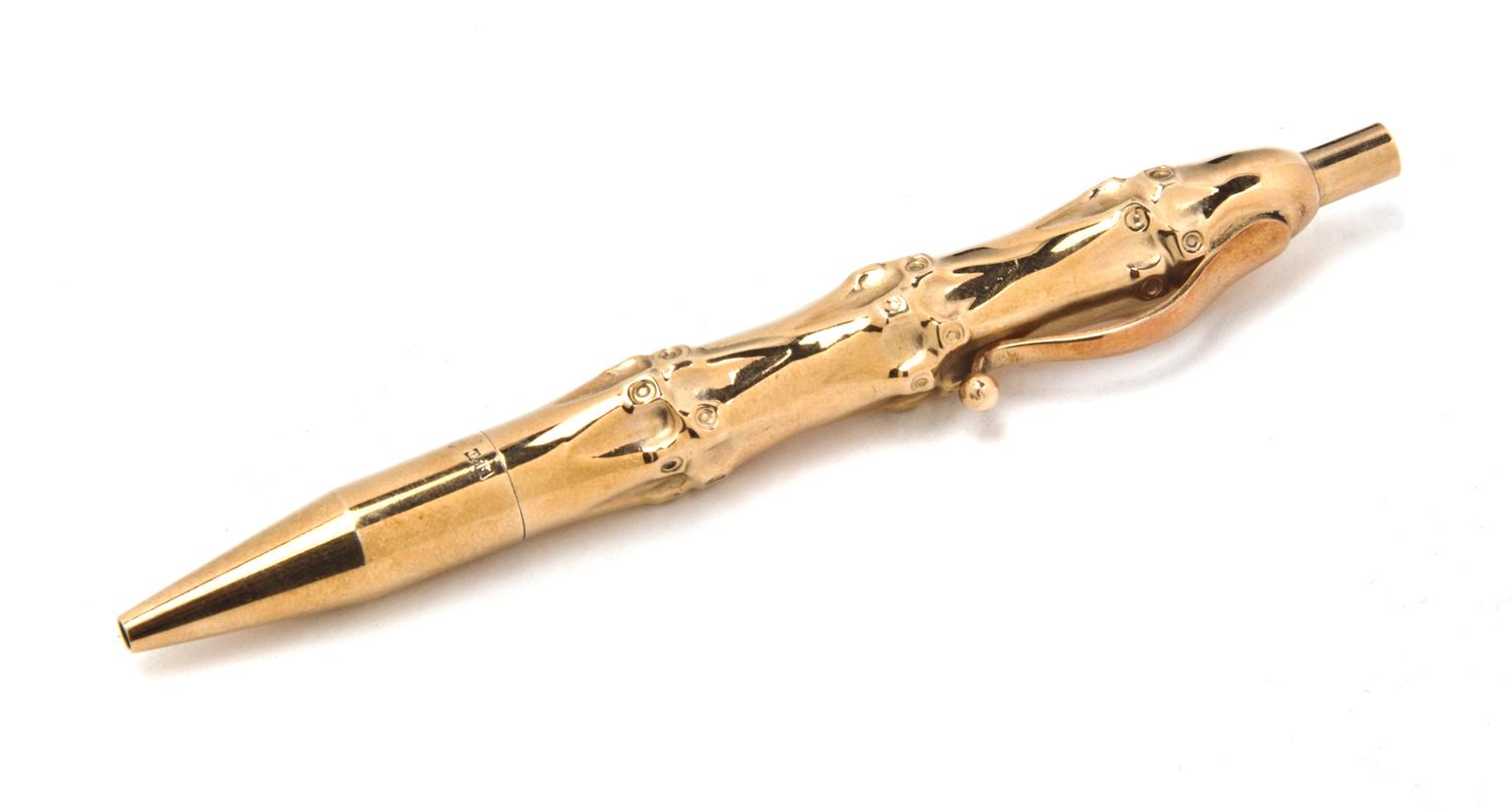 A 14 Karat Gold Ball Point Pen, Cartier, Length 4 1/8 inches.