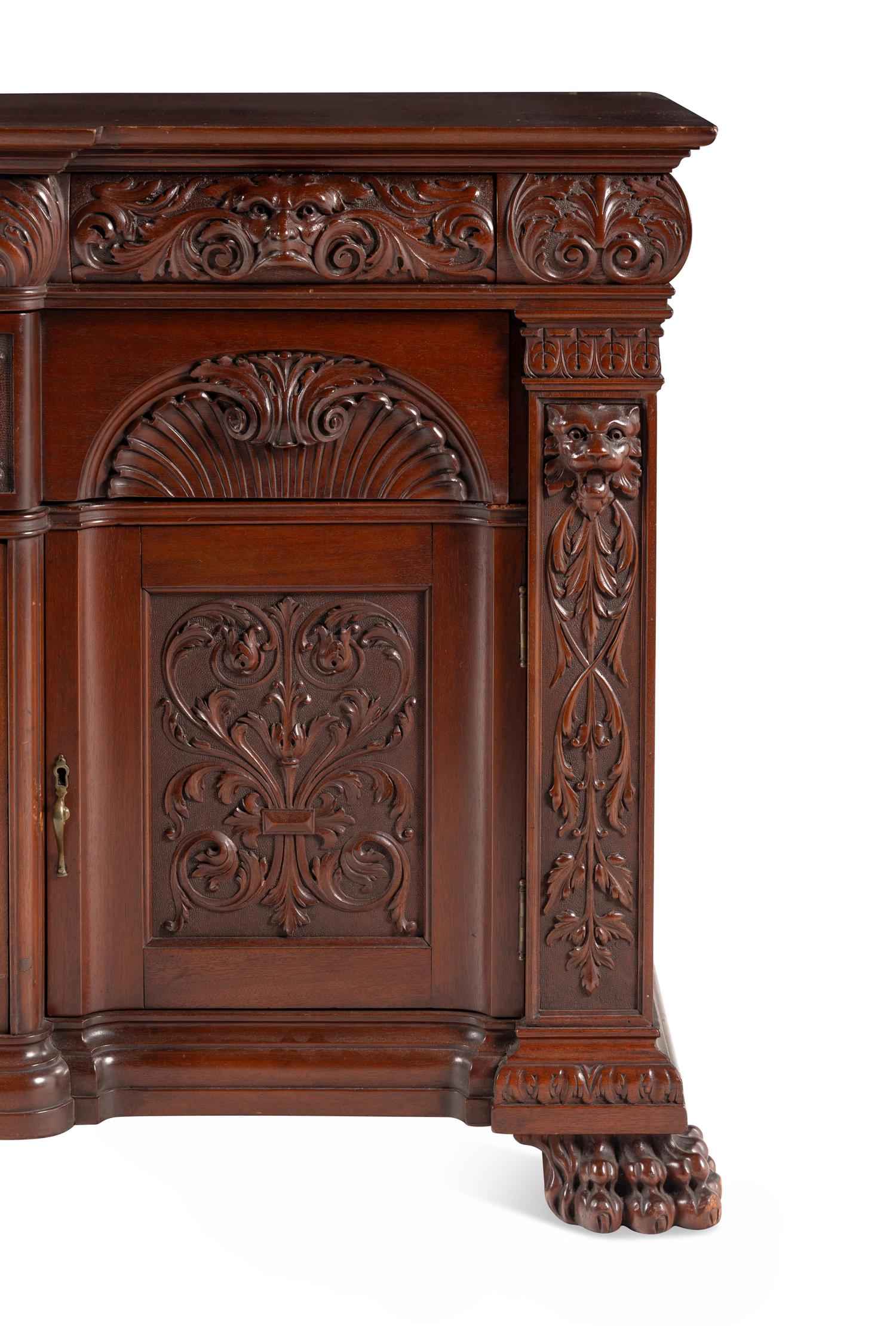 A Renaissance Revival Carved Mahogany Serving Cabinet