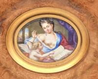 Attributed To The Huaud Brothers [Jean-Pierre (1655-1723) And Amy Huaud (1657-1724)], A Portrait Miniature Of A Lady With Book And Putto, Possibly Depicting Psyche And Cupid