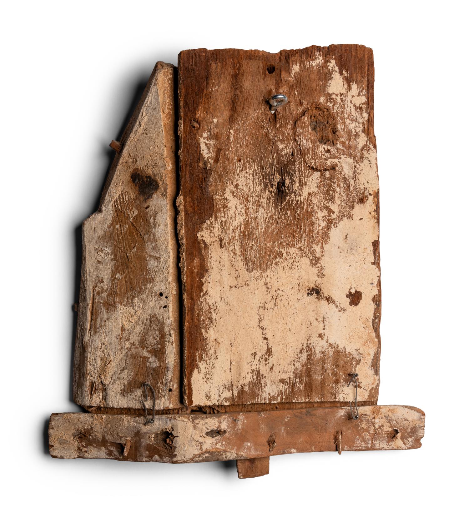 An Egyptian Painted Wood Sarcophagus Fragment