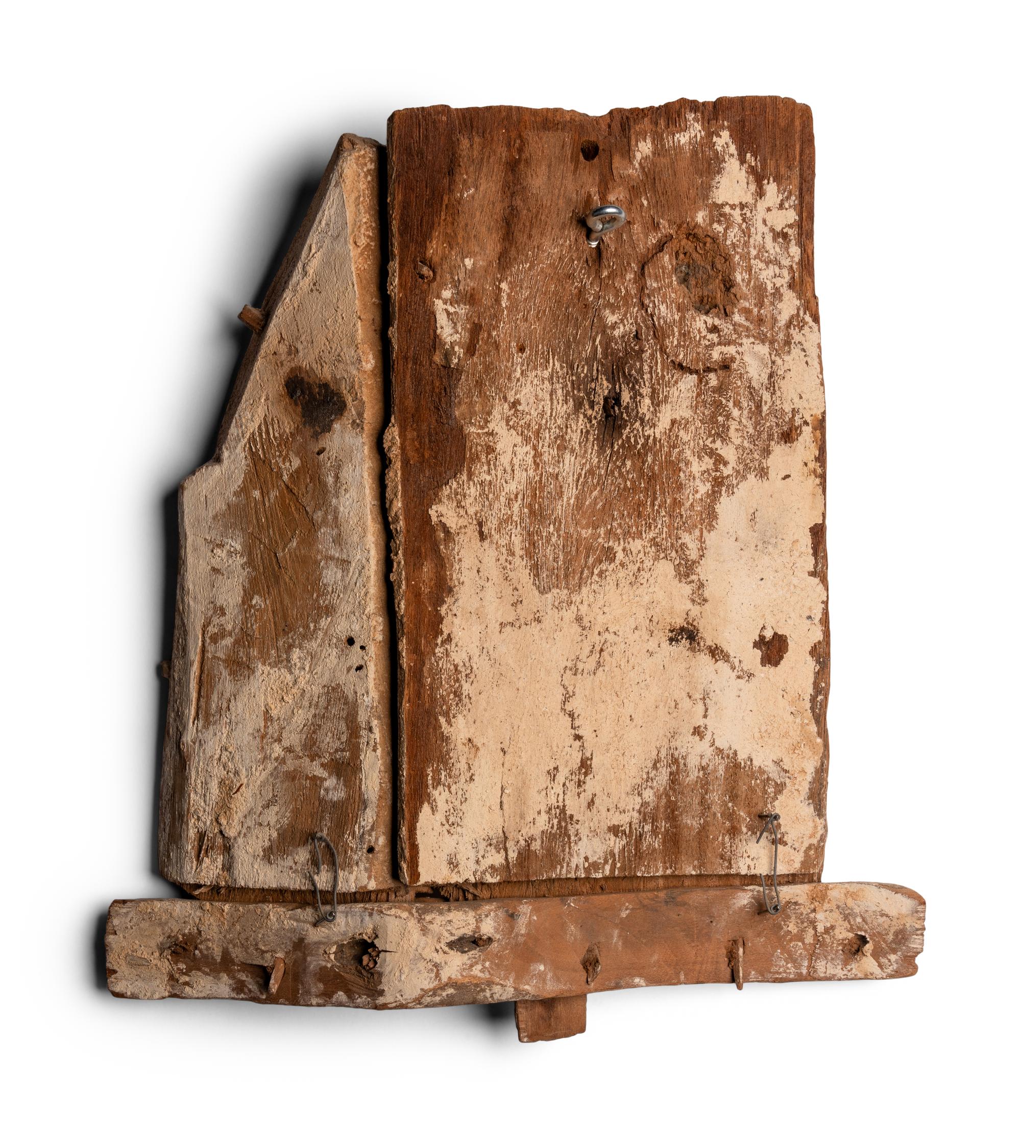 An Egyptian Painted Wood Sarcophagus Fragment