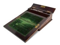 A Continental Marquetry and Gilt Metal Mounted Lap Desk, Width 14 1/4 inches.