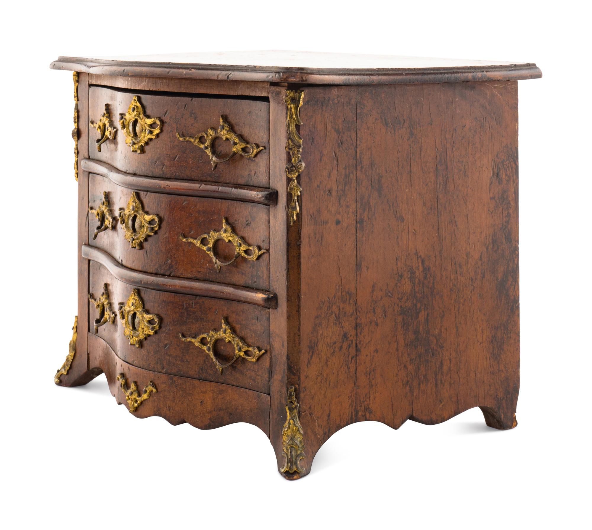 A Louis XV Style Walnut Diminutive Commode