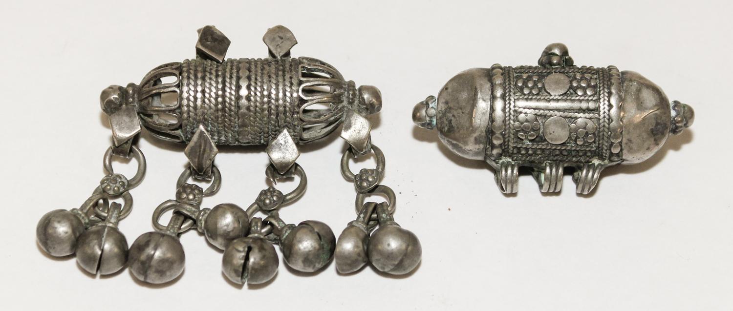 A Pair of Bedouin Silver Prayer Box Pendants Length of each 2 inches.