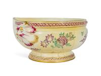 A Continental Polychrome Decorated Parcel Gilt Faience Corner Lavabo and Basin