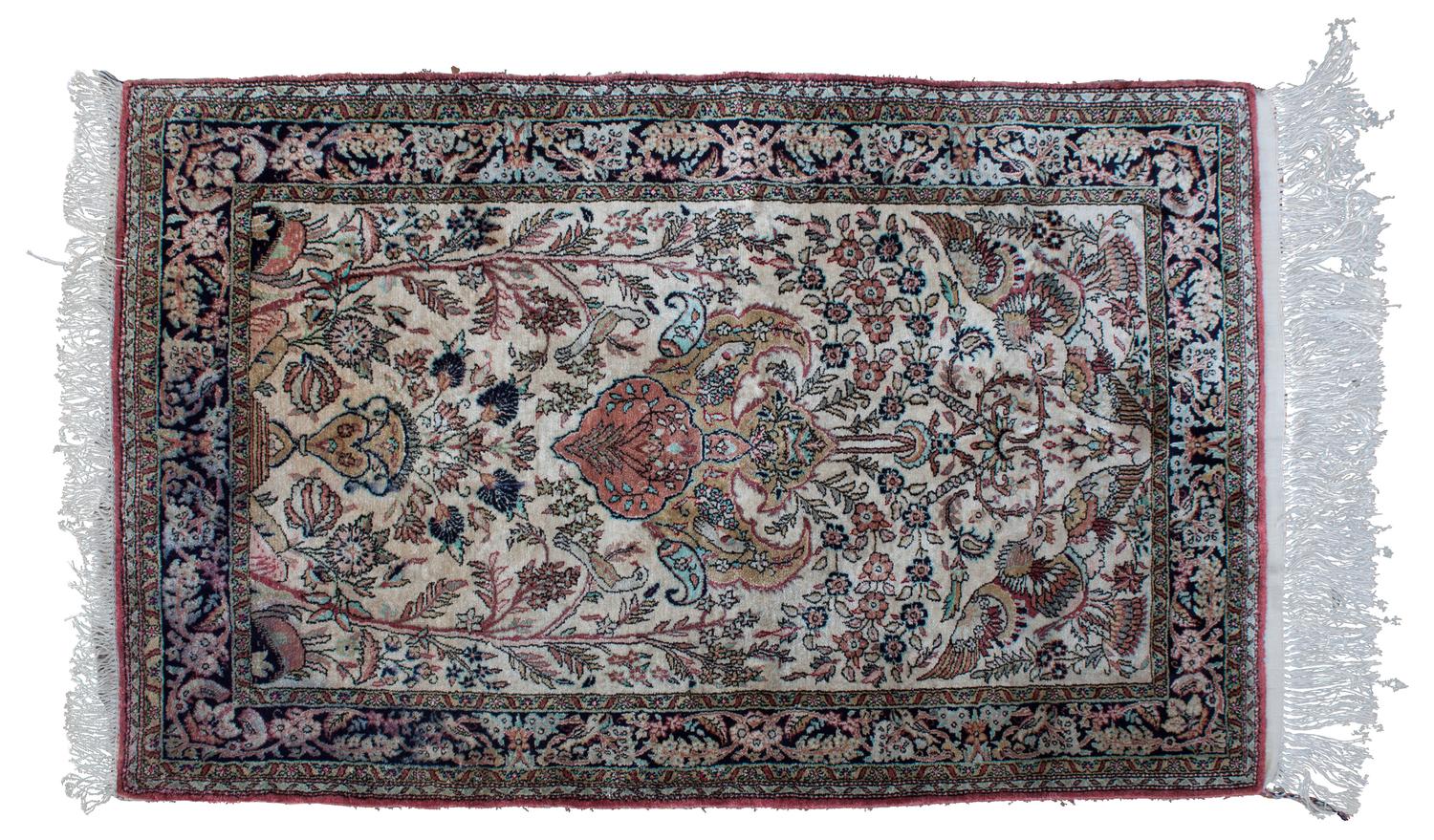 A Silk Prayer Rug 2 feet 7 inches by 4 feet 3 inches.