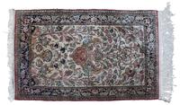 A Silk Prayer Rug 2 feet 7 inches by 4 feet 3 inches.