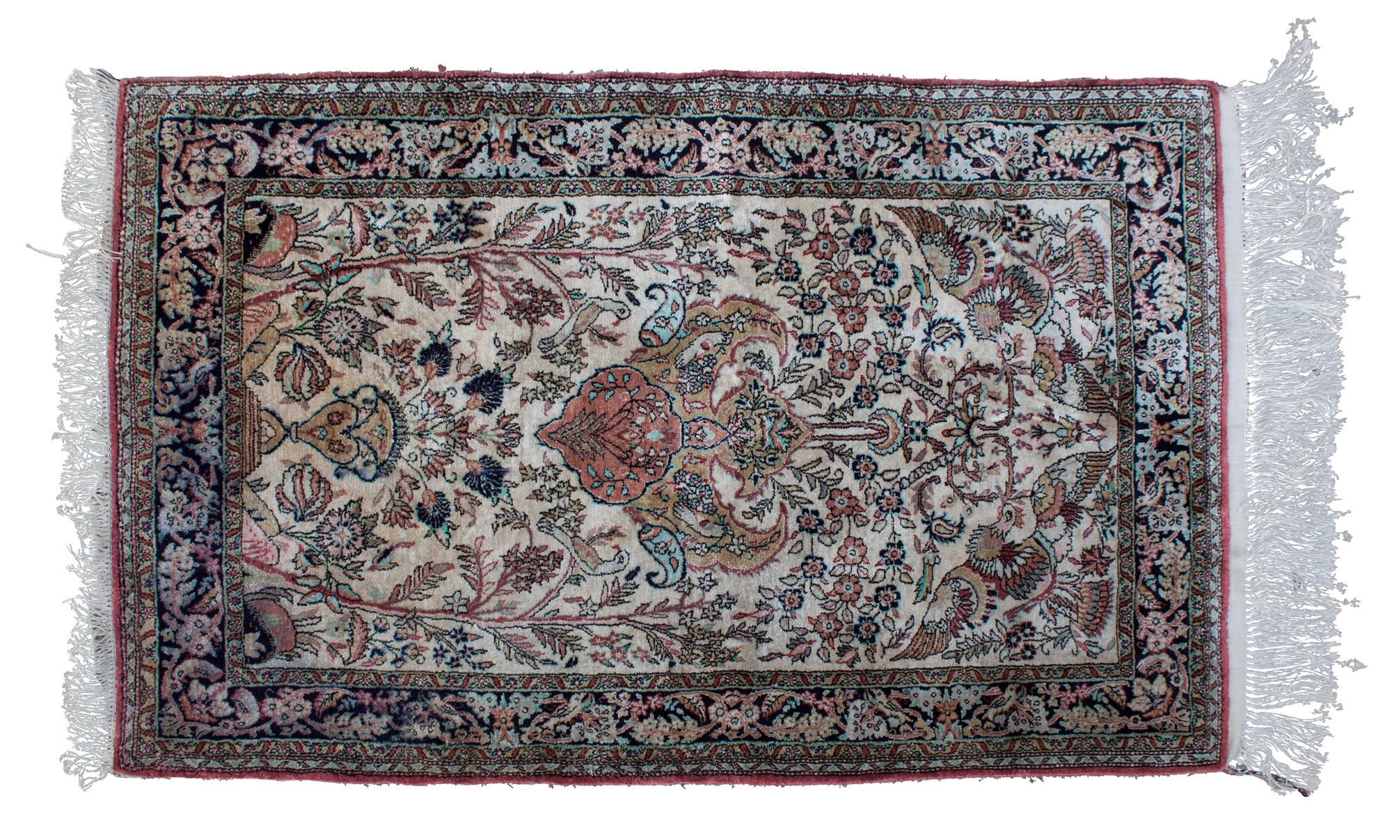 A Silk Prayer Rug 2 feet 7 inches by 4 feet 3 inches.