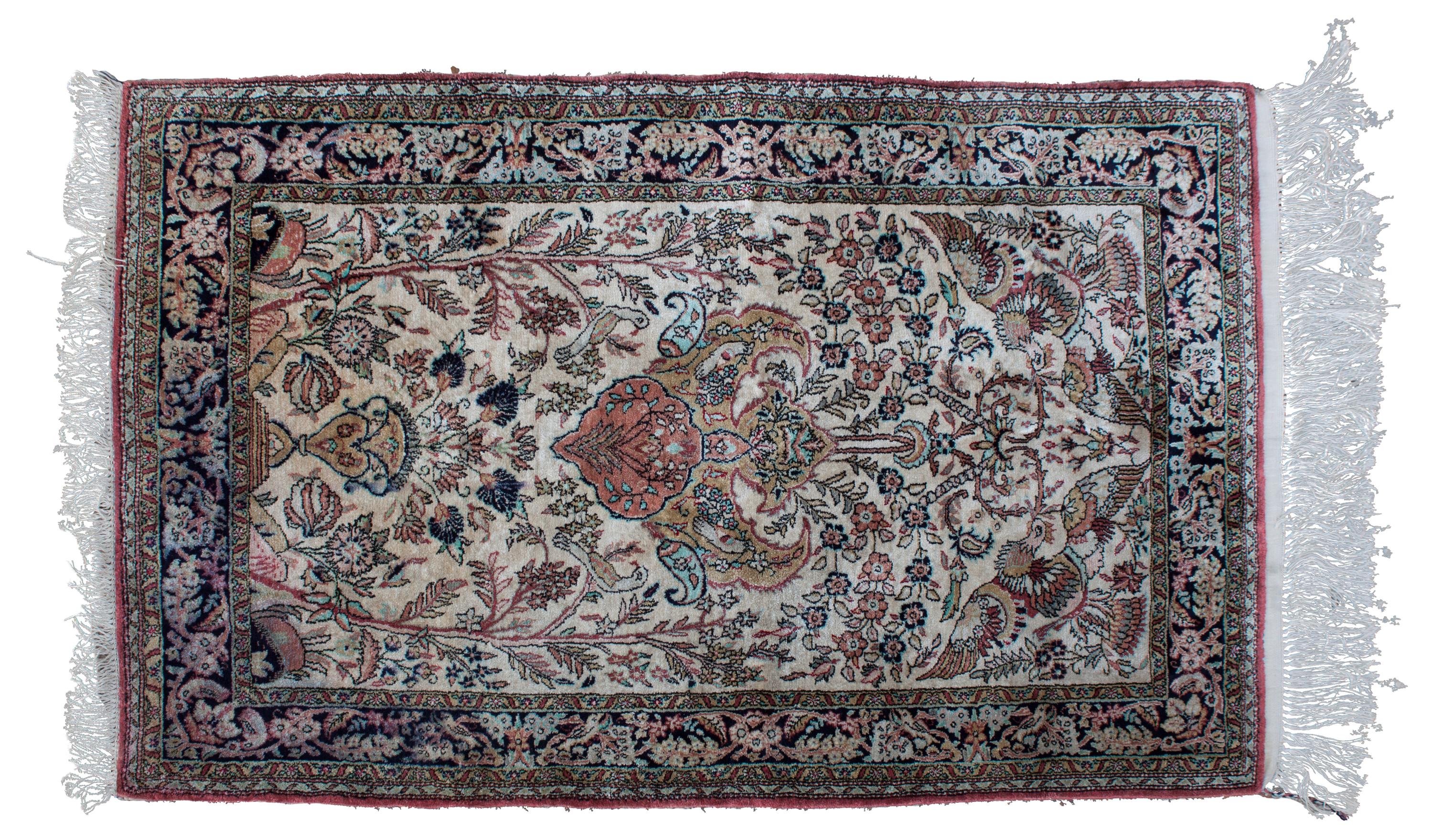 A Silk Prayer Rug 2 feet 7 inches by 4 feet 3 inches.