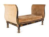 An Empire Ebonized and Parcel Gilt Daybed