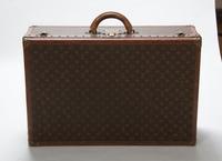 Two Louis Vuitton Monogram Canvas Soft-sided Suitcases, 31 x 20 1/2 x 10 inches.