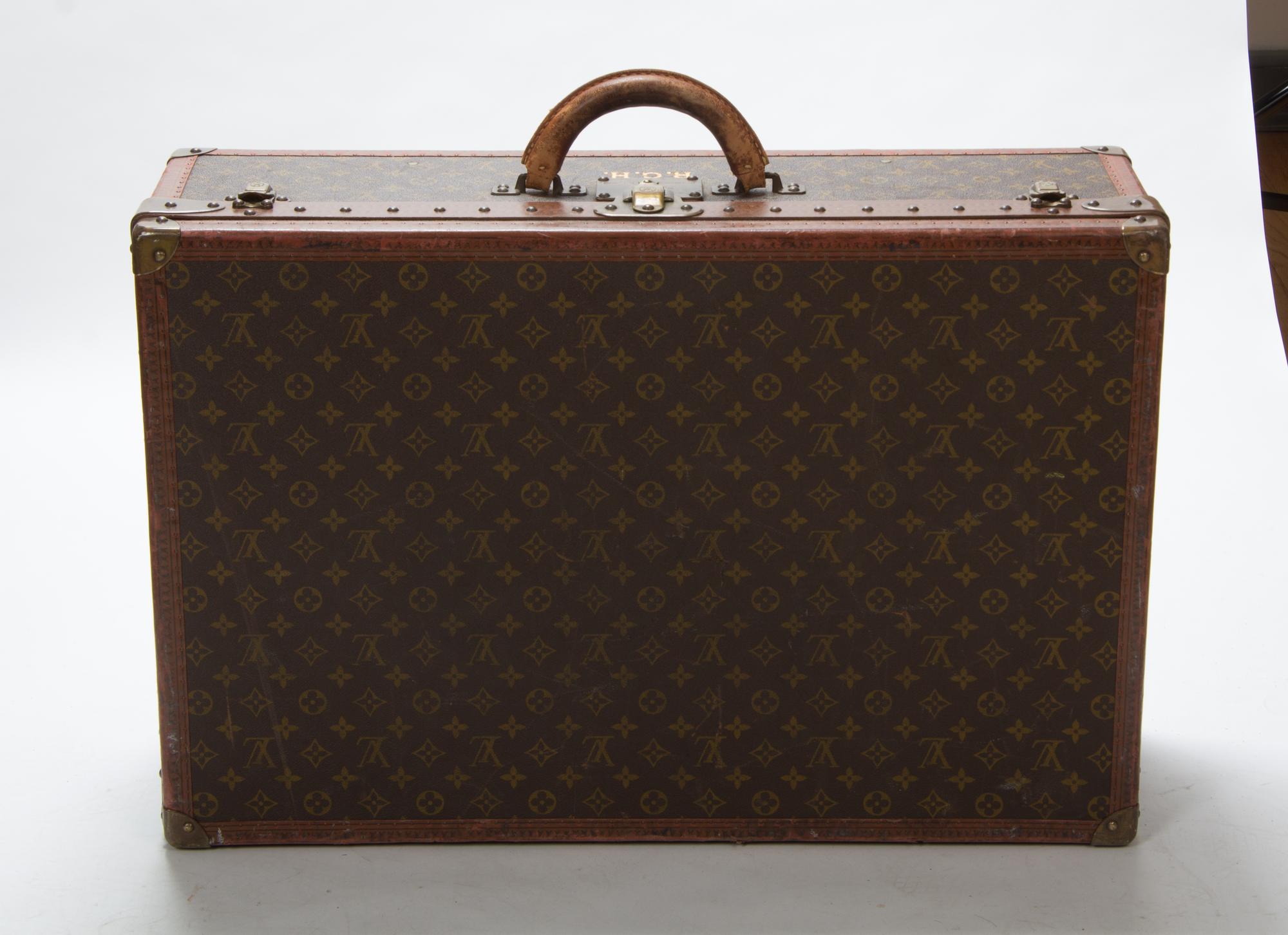 Two Louis Vuitton Monogram Canvas Soft-sided Suitcases, 31 x 20 1/2 x 10 inches.