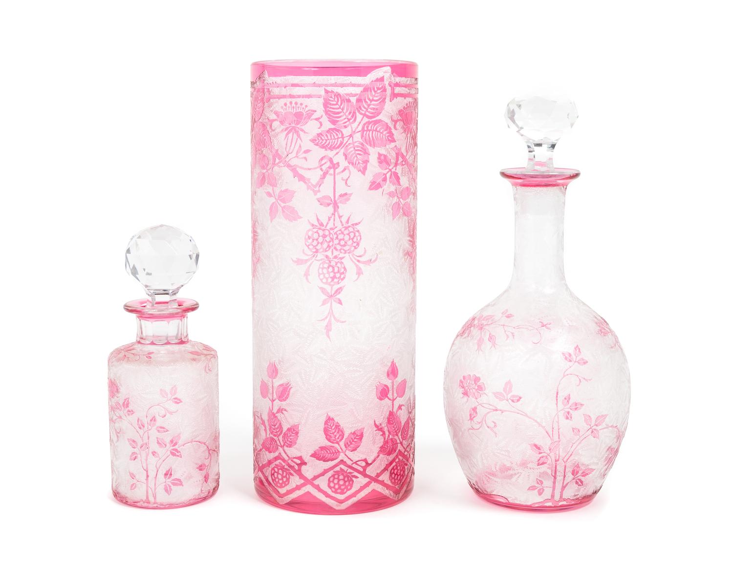 Val St. Lambert, BELGIUM, 20TH CENTURY, three crystal articles, comprising a vase and two bottles, with continuous floral decoration