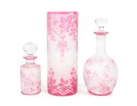 Val St. Lambert, BELGIUM, 20TH CENTURY, three crystal articles, comprising a vase and two bottles, with continuous floral decoration