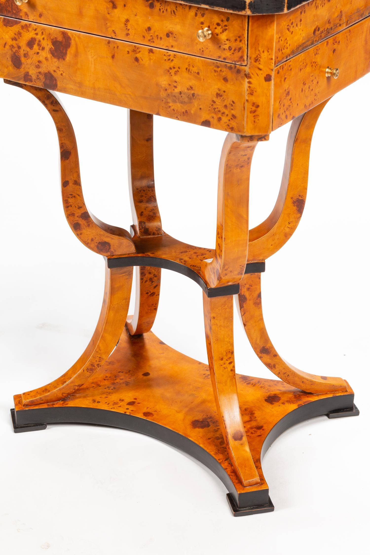 A Pair of Biedermeier Style Parcel Ebonized Burlwood Work Tables