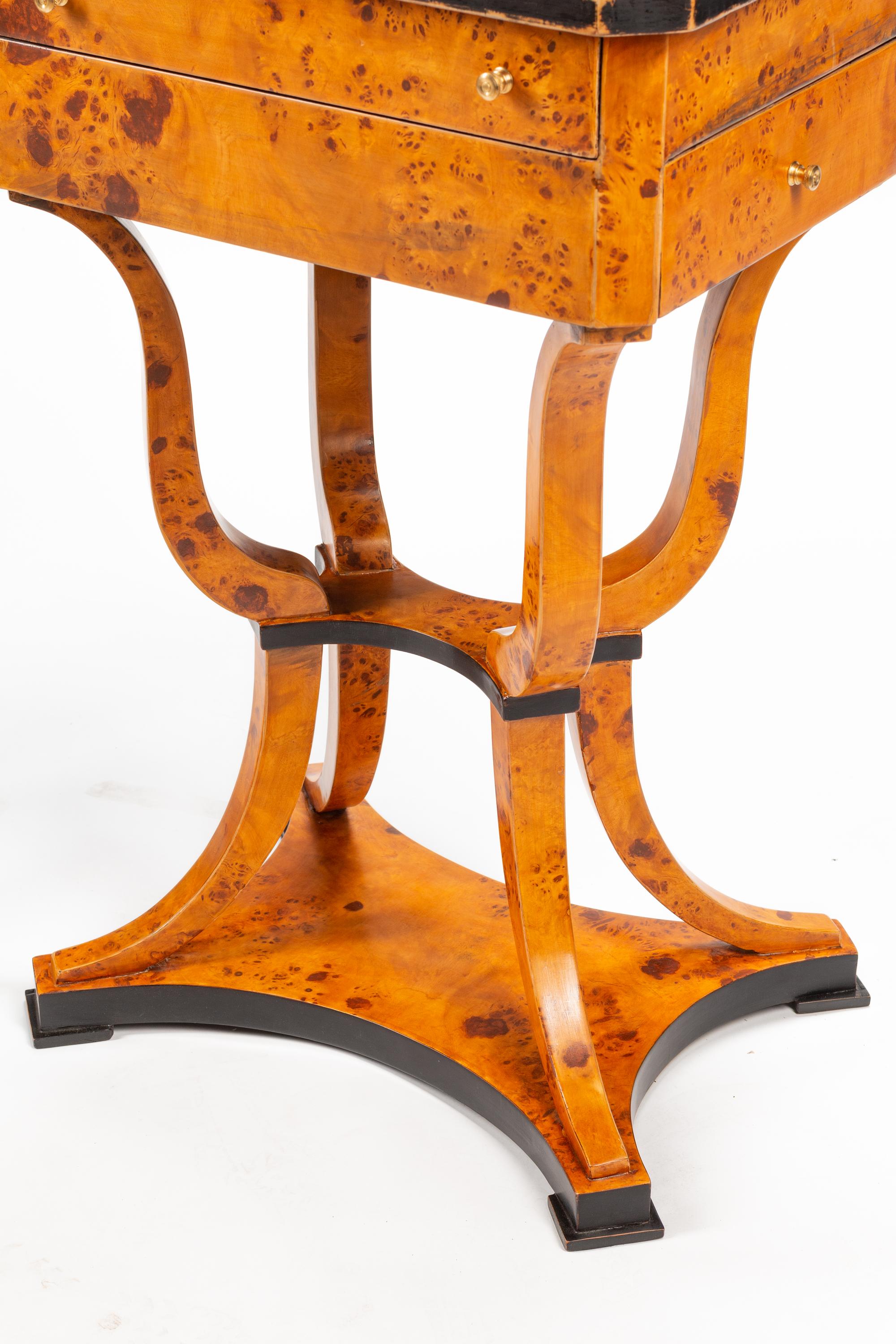 A Pair of Biedermeier Style Parcel Ebonized Burlwood Work Tables