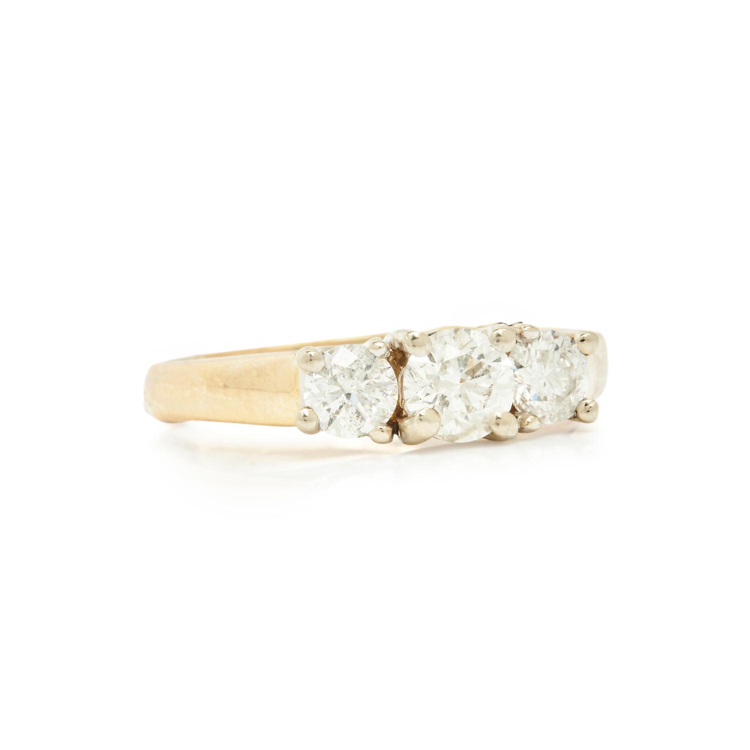 YELLOW GOLD AND DIAMOND THREE STONE RING