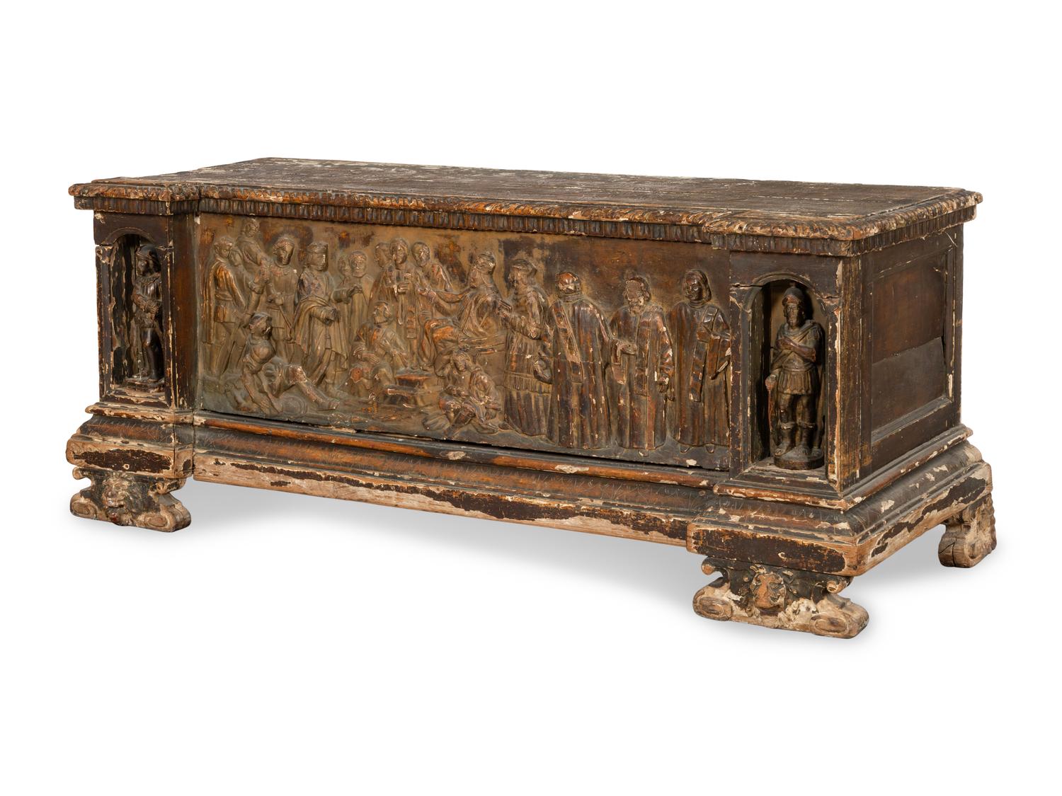 A Continental Baroque Carved Cassone with Carved Relief Panel