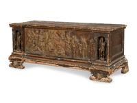 A Continental Baroque Carved Cassone with Carved Relief Panel