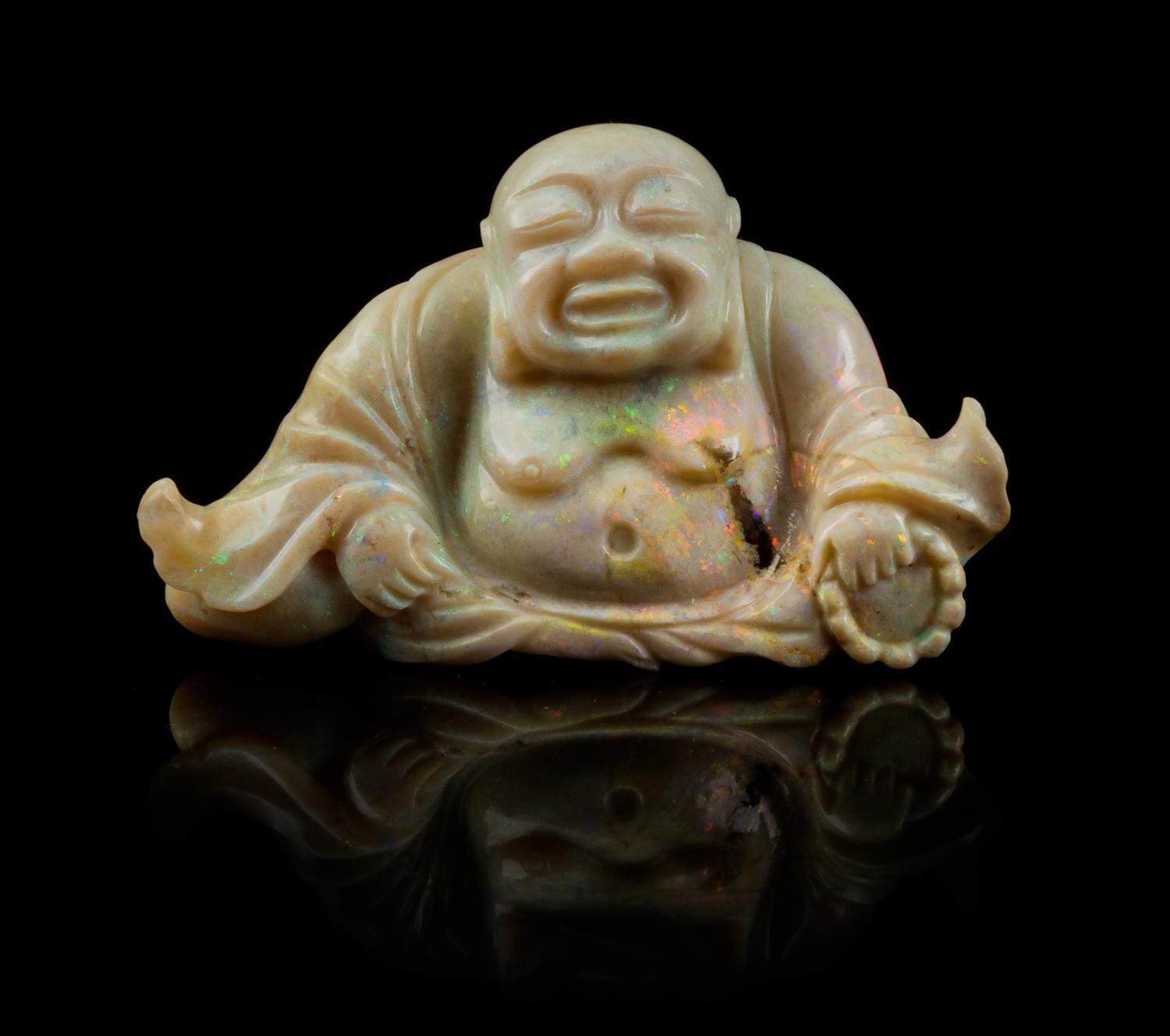 A Carved Opal Figure of Laughing Buddha, Mille Height 1 3/4 inches.