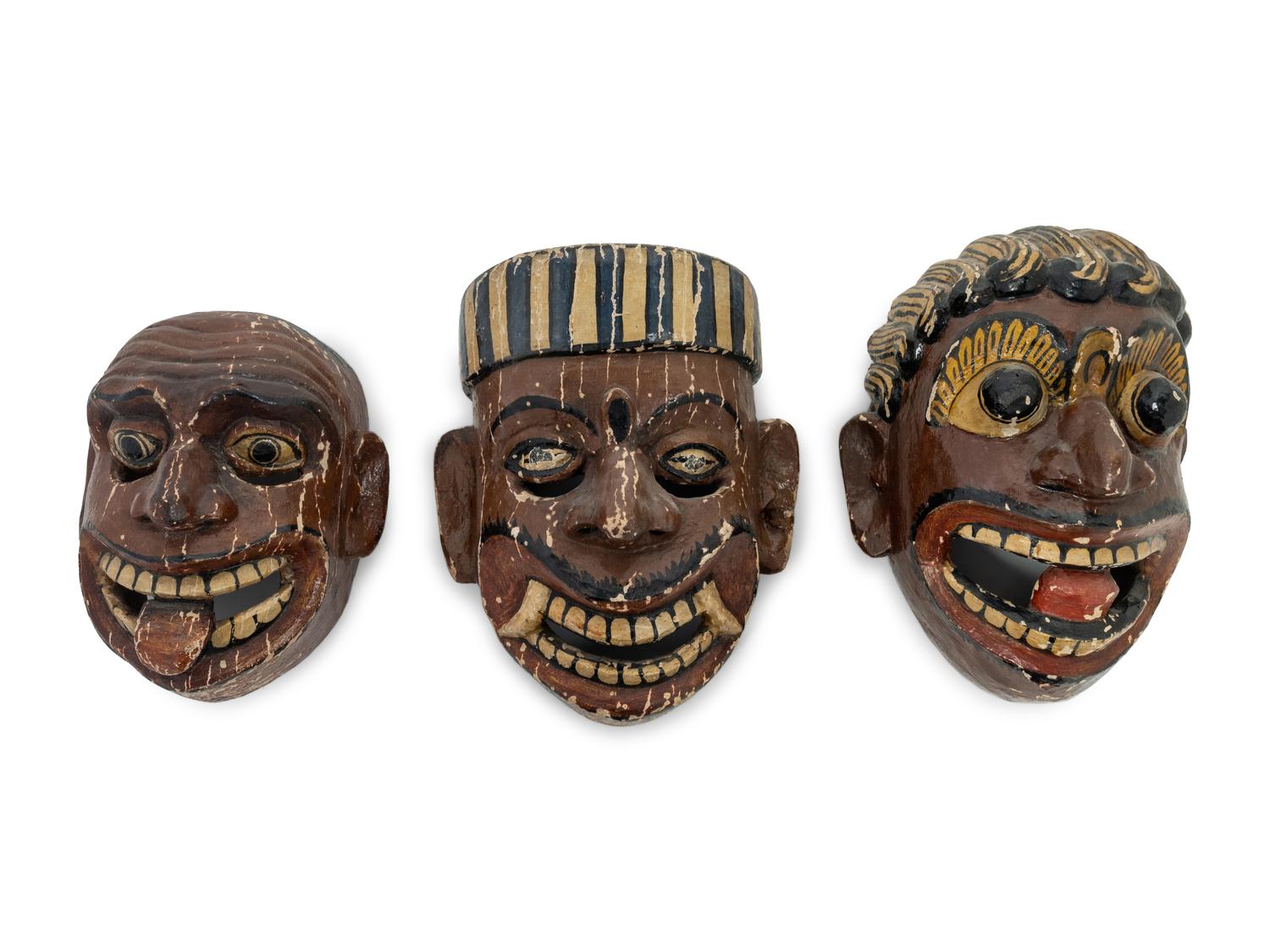 Three Mexican Carved and Polychromed Wood Masks