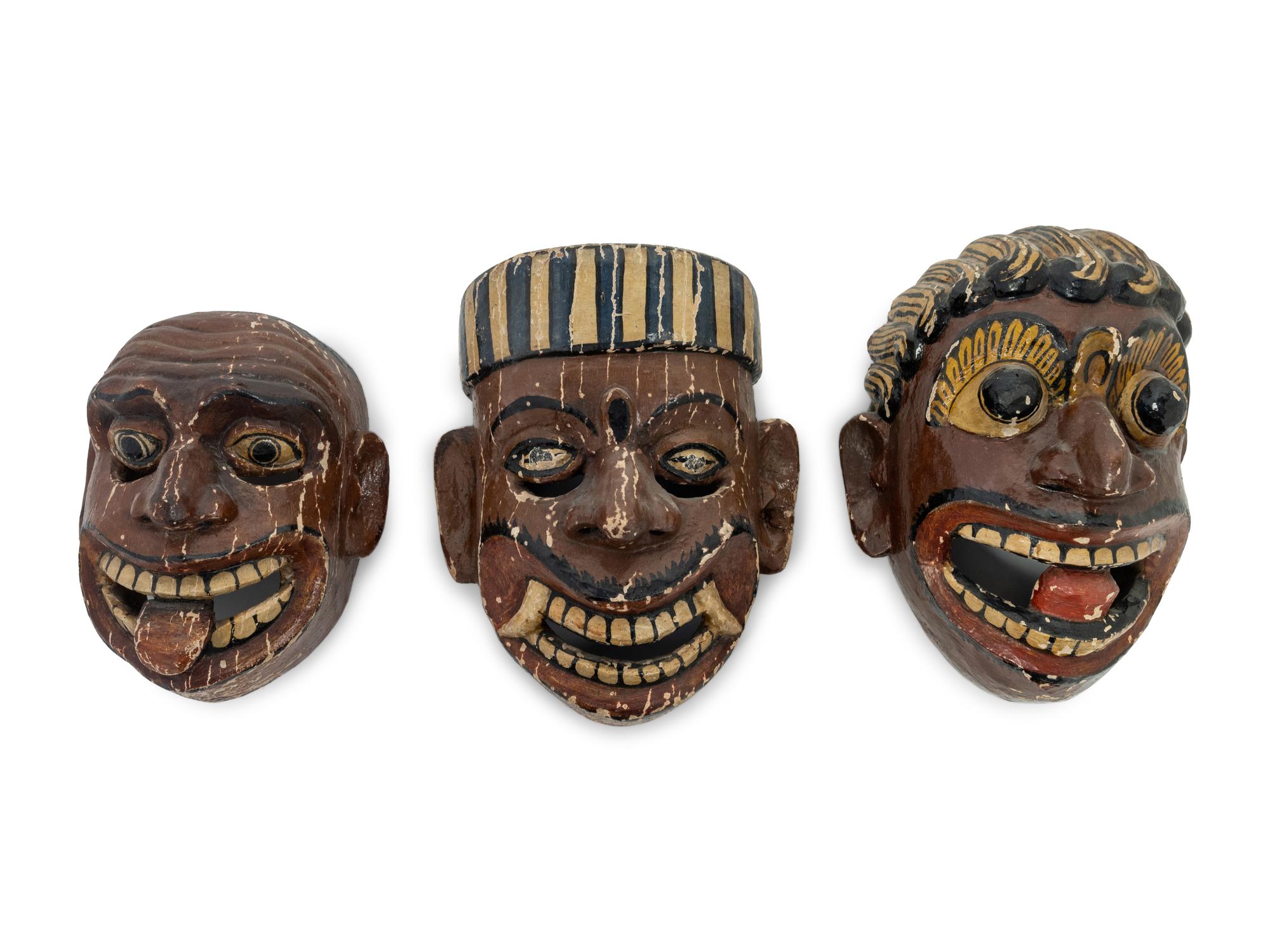 Three Mexican Carved and Polychromed Wood Masks