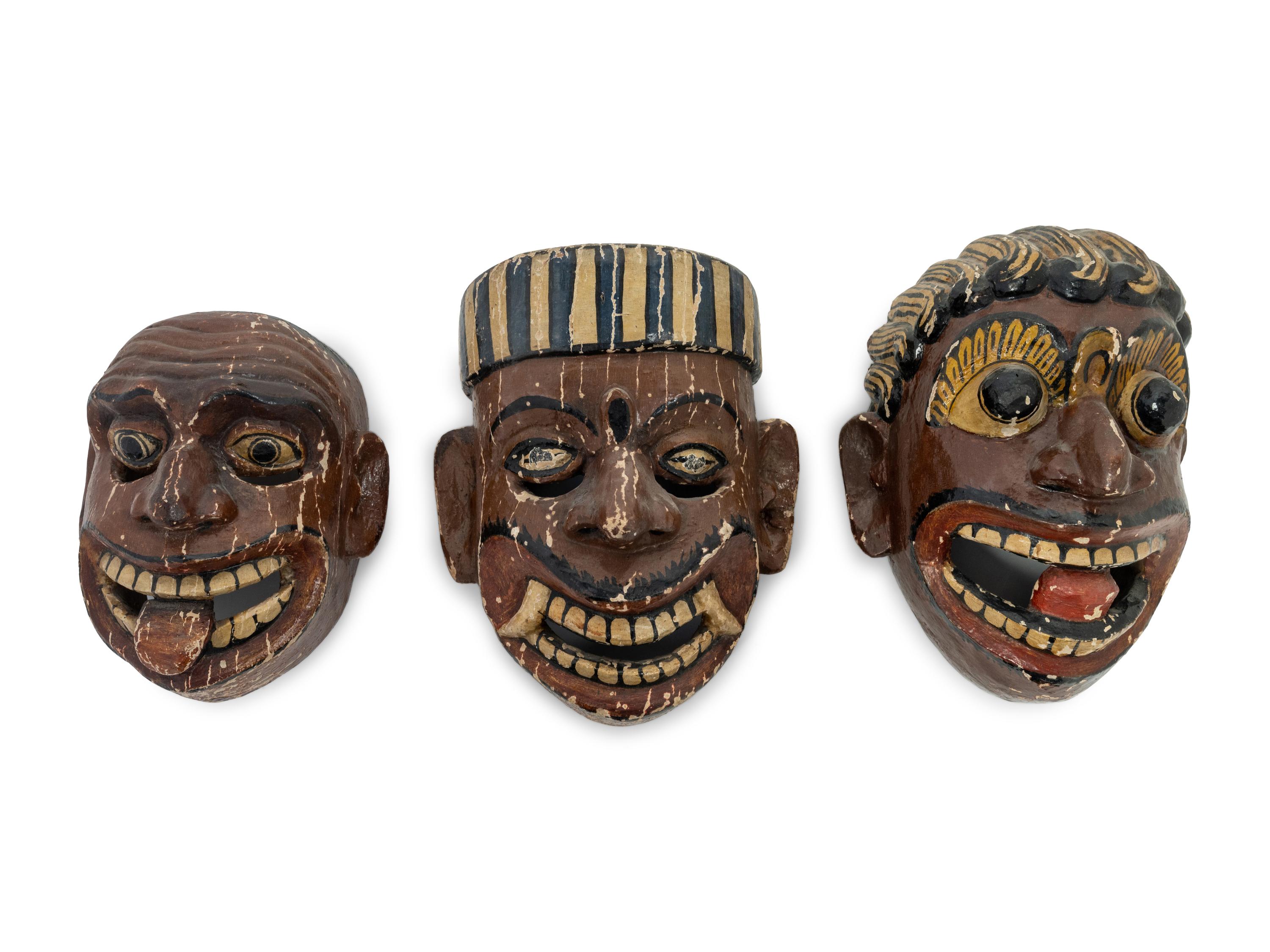 Three Mexican Carved and Polychromed Wood Masks