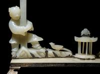An Edward I. Farmer White Jade and Silver Mounted Chinoiserie Desk Clock, Circa 1930 Edward I. Farmer約1930年製中國風白玉童子座鐘