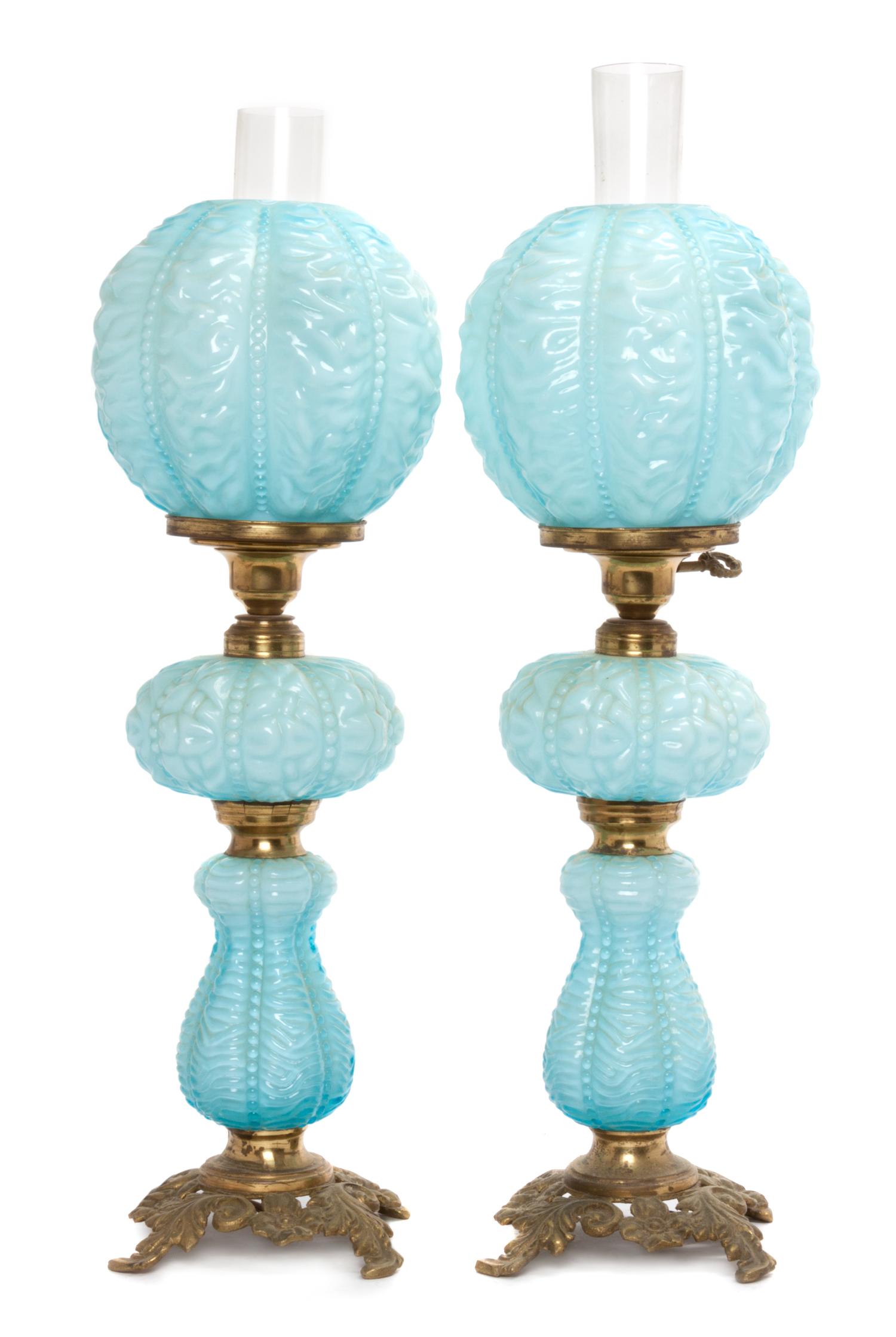 A Pair of Victorian Style Molded Glass Table Lamps Height overall 24 inches.