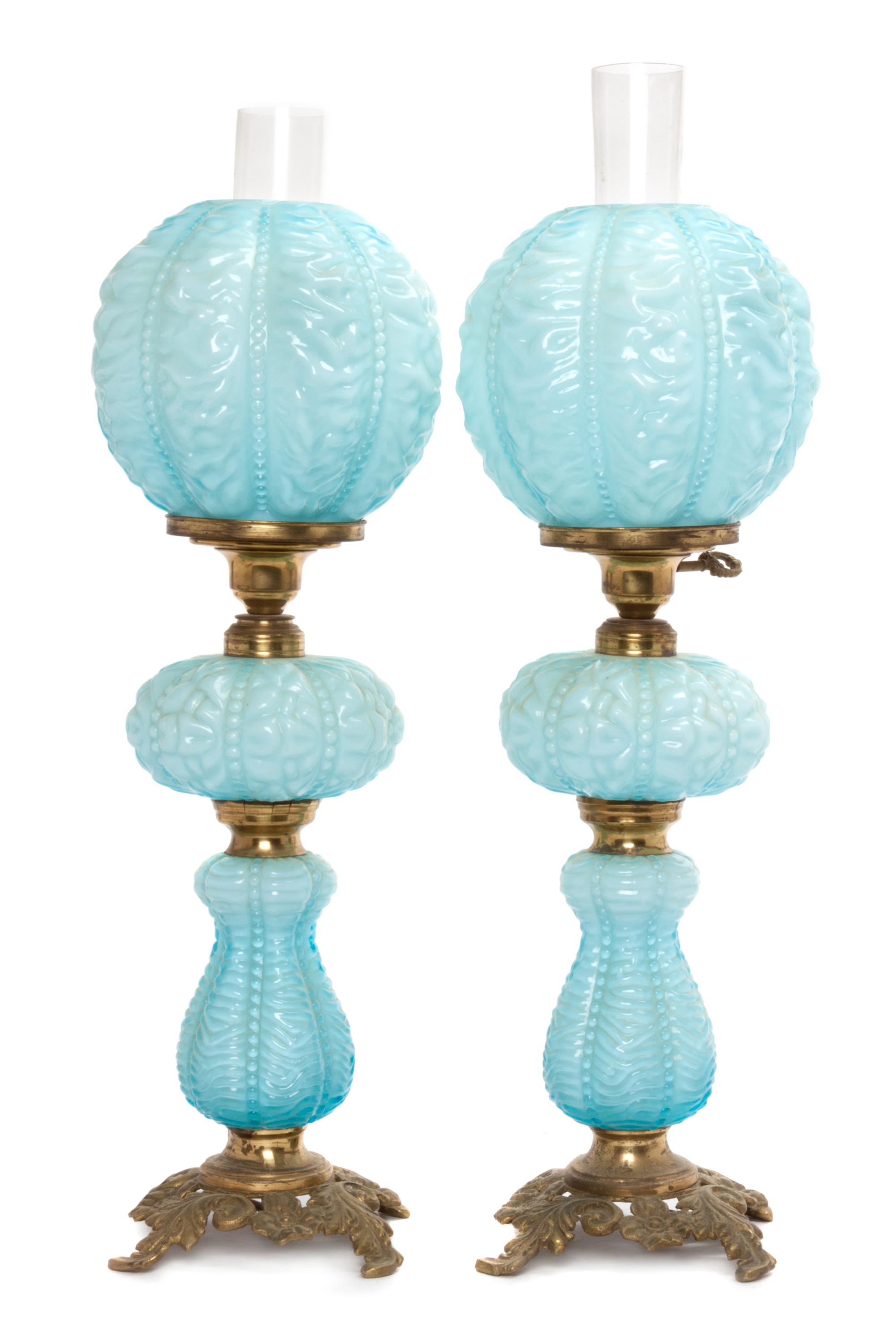 A Pair of Victorian Style Molded Glass Table Lamps Height overall 24 inches.